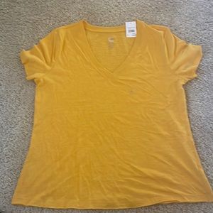 60% cotton 40% modal, machine wash cold, beautiful yellow color.
